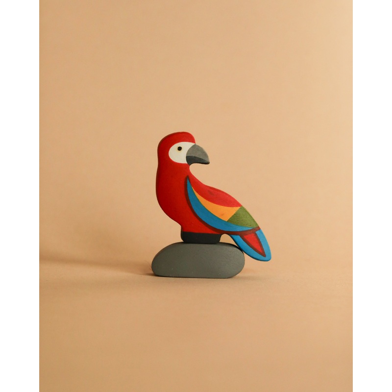 Handmade Wooden Parrot On A Rock